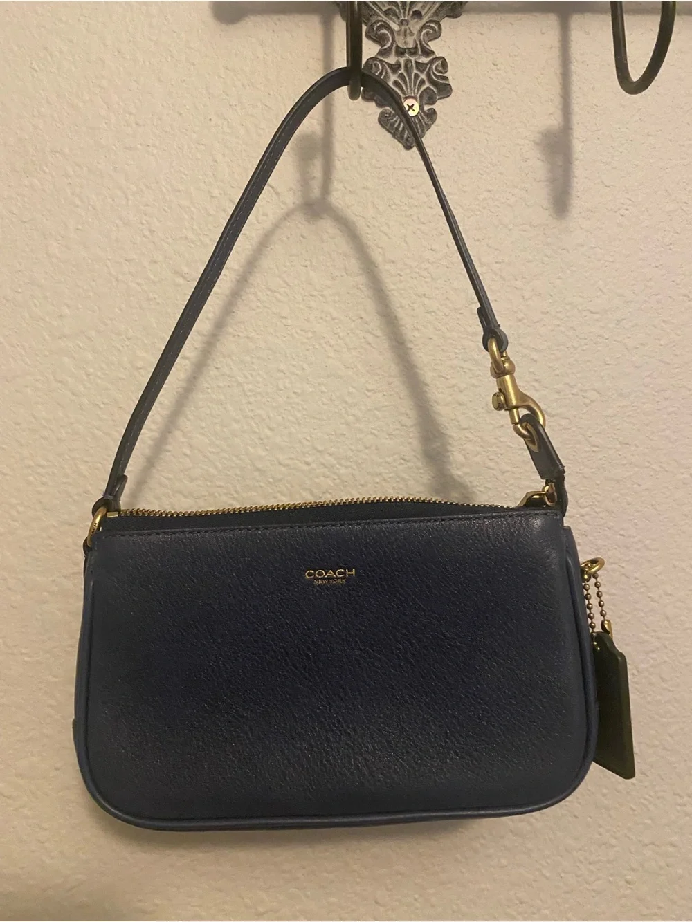 Coach Navy Pebbled Leather Mini Wristlet with Gold Hardware